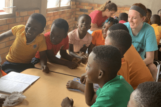 Conroy in 6th grade classroom in Ghana